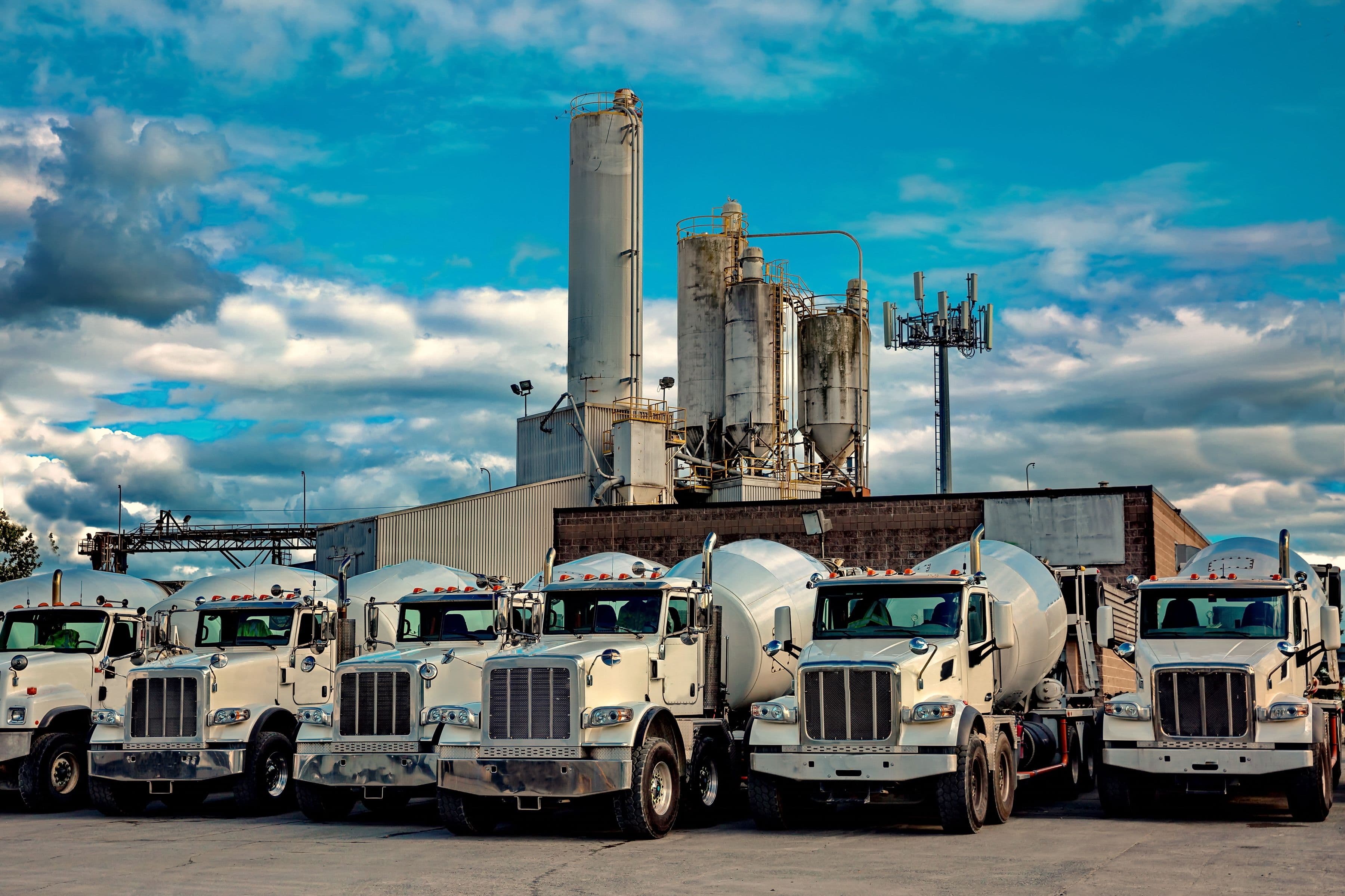 Fleet of ready-mix concrete trucks at an Australian batching plant